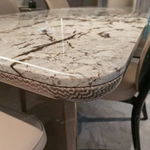 White Marble Dining Table with Woven Leather Side Panels and Polished Metal Frame